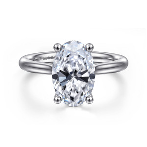 Gabriel & Co. ER16512O12PT4JJ platinum Classic engagement ring, front view of an oval center held in ball tipped prongs above a smooth band