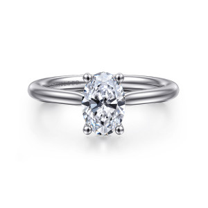 Gabriel & Co. ER16512O4PT4JJ platinum Classic engagement ring, front view of an oval center held by four rounded prongs on a smooth tapering band