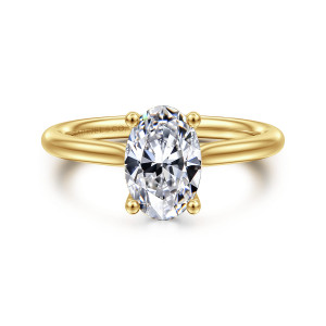 Gabriel & Co. ER16512O6Y44JJ 14 karat yellow gold Classic engagement ring, front view of an oval center with ball tipped prongs at each end above a smooth band
