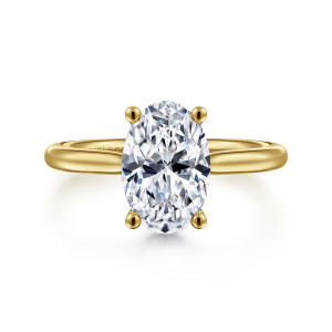 Gabriel & Co. ER16512O8Y44JJ 14 karat yellow gold Classic engagement ring, front view of a tall oval center on ball tipped prongs over a smooth tapered band