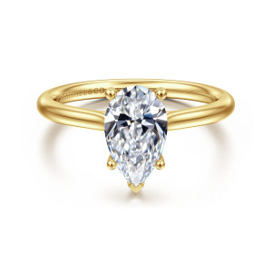 Gabriel & Co. ER16512P6Y44JJ 14 karat yellow gold Classic engagement ring, front view of a pear shaped center with a pointed V tip and ball tipped prongs