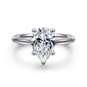 Gabriel & Co. ER16512P8W44JJ 14 karat white gold Classic engagement ring, front view of a pear shaped center with ball tipped prongs and a pointed prong at its tip