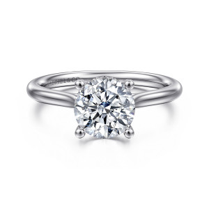 Gabriel & Co. ER16512R6PT4JJ platinum Classic engagement ring, front view of a round center held at four points by rounded prongs above a plain shank