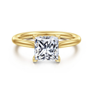 Gabriel & Co. ER16512S6Y44JJ 14 karat yellow gold Classic engagement ring, front view of a square center gripped at each corner, tiny stones showing at the back edge