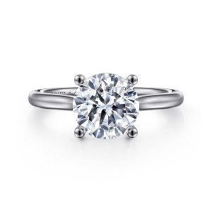 Gabriel & Co. ER16514R8W4JJJ 14 karat white gold Contemporary engagement ring, front view of a round center held by four ball tipped prongs on a slim polished band