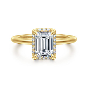 Gabriel & Co. ER16516E6Y44JJ 14 karat yellow gold Classic engagement ring, front view of an emerald cut center with rounded corner claws and tiny stones lining the rim