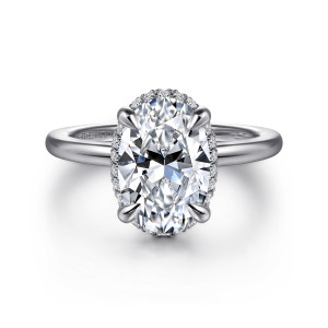 Gabriel & Co. ER16516O8W44JJ 14 karat white gold Classic engagement ring, front view of an oval center with four claw prongs and small diamonds at its edge
