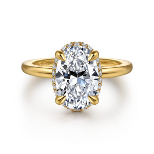 Gabriel & Co. ER16516O8Y44JJ 14 karat yellow gold Classic engagement ring, front view of an oval center with four claw prongs and a thin diamond edge behind it