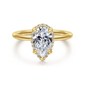 Gabriel & Co. ER16516P6Y44JJ 14 karat yellow gold Classic engagement ring, front view of a pear shaped center ringed by small stones with a claw prong at the point