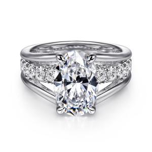 Gabriel & Co. ER16518O8W44JJ 14 karat white gold Contemporary engagement ring, front view of an oval center with a row of round diamonds between split rails