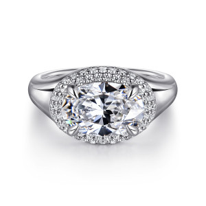 Gabriel & Co. ER16519O8W44JJ 14 karat white gold Contemporary engagement ring, front view of a sideways oval center inside a wide halo of small stones, held by four prongs