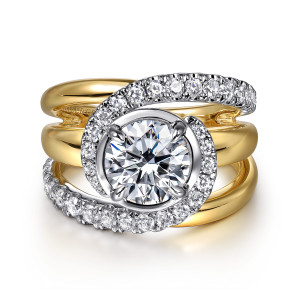 Gabriel & Co. ER16520R6M44JJ 14 karat white and yellow gold Contemporary engagement ring, front view of a round center in a polished collar wrapped by stones over open strands