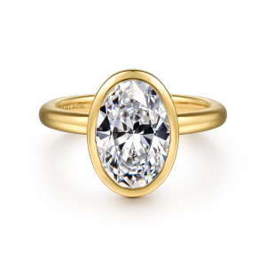 Gabriel & Co. ER16526O8Y4JJJ 14 karat yellow gold Contemporary engagement ring, front view of an oval center inside a smooth bezel rim on a plain round band