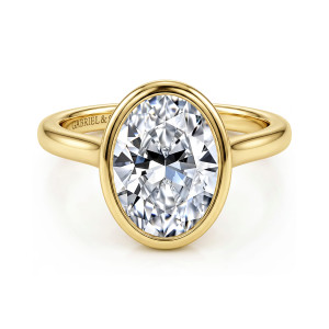Gabriel & Co. ER16527O12Y4JJJ 14 karat yellow gold Contemporary engagement ring, front view of an oval center enclosed in a smooth rounded bezel above a plain band