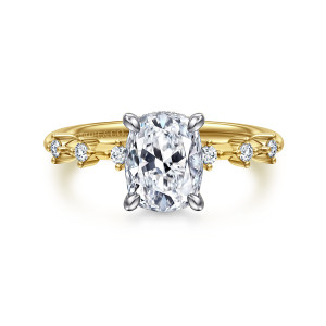 Gabriel & Co. ER16530G7M44JJ 14 karat white and yellow gold Starlight engagement ring, front view of an elongated center with round diamonds set apart on each shoulder of the band