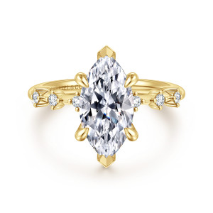 Gabriel & Co. ER16530M10Y44JJ 14 karat yellow gold Starlight engagement ring, front view of a marquise center with V tipped points and small round diamonds spaced along the shoulders