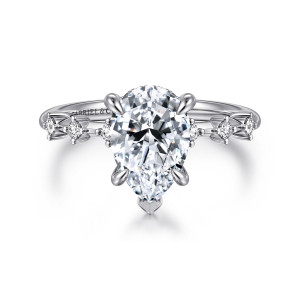 Gabriel & Co. ER16530P8W44JJ 14 karat white gold Starlight engagement ring, front view of a pear shaped center with a pointed prong at its tip