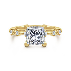 Gabriel & Co. ER16530S6Y44JJ 14 karat yellow gold Starlight engagement ring, front view of a princess cut center in square corner prongs flanked by spaced round diamonds