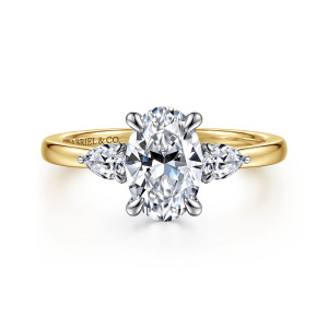 Gabriel & Co. ER16551O6M44JJ 14 karat white and yellow gold Contemporary engagement ring, front view of an oval center flanked by pear stones with points turned outward