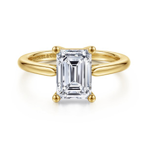 Gabriel & Co. ER16561E8Y4JJJ 14 karat yellow gold Contemporary engagement ring, front view of an emerald cut center at four ball tipped prongs on a plain band