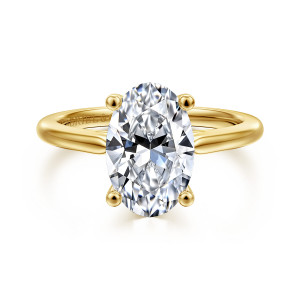 Gabriel & Co. ER16561O12Y4JJJ 14 karat yellow gold Contemporary engagement ring, front view of an oval center gripped by four ball tipped prongs on a smooth band