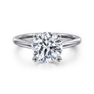 Gabriel & Co. ER16561R10W4JJJ 14 karat white gold Contemporary engagement ring, front view of a round center gripped by four ball tipped prongs