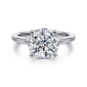 Gabriel & Co. ER16561R12W4JJJ 14 karat white gold Contemporary engagement ring, front view of a round center held by four ball tipped prongs on a plain polished band
