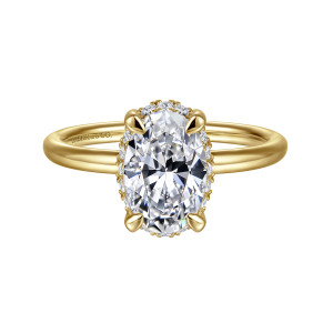 Gabriel & Co. ER16565O6Y44JJ 14 karat yellow gold Contemporary engagement ring, front view of an oval center with four teardrop shaped claws and a fine edge of halo showing