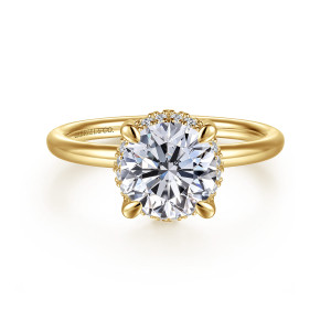Gabriel & Co. ER16565R6Y44JJ 14 karat yellow gold Contemporary engagement ring, front view of a round center in four claw prongs with tiny diamonds peeking out around its edge