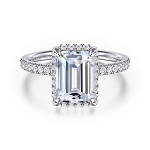 Gabriel & Co. ER16566E10W44JJ 14 karat white gold Contemporary engagement ring, front view of an emerald cut center in four rounded claws with a hidden halo row beneath