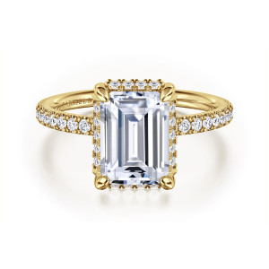 Gabriel & Co. ER16566E10Y44JJ 14 karat yellow gold Contemporary engagement ring, front view of an emerald cut center in rounded corner prongs, small diamonds along the shoulders
