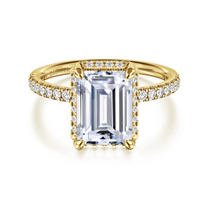 Gabriel & Co. ER16566E12Y44JJ 14 karat yellow gold Contemporary engagement ring, front view of an emerald cut center framed by four rounded prongs and a halo along its edge
