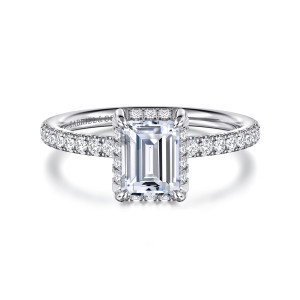 Gabriel & Co. ER16566E4W44JJ 14 karat white gold Contemporary engagement ring, front view of an emerald cut center with small stones tucked under its edges