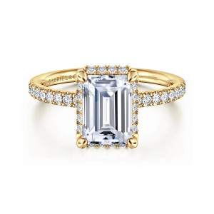 Gabriel & Co. ER16566E8Y44JJ 14 karat yellow gold Contemporary engagement ring, front view of an emerald cut center with rounded corner prongs and diamonds peeking at its edges