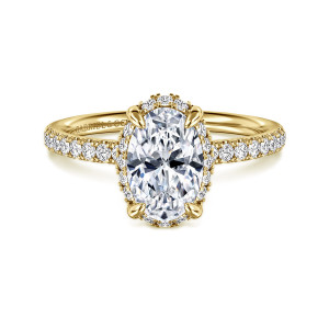 Gabriel & Co. ER16566O6Y44JJ 14 karat yellow gold Contemporary engagement ring, front view of an oval center with a rim of small stones peeking out around its edge