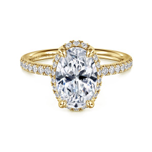 Gabriel & Co. ER16566O8Y44JJ 14 karat yellow gold Contemporary engagement ring, front view of an oval center with small diamonds tucked beneath its rim and along the band