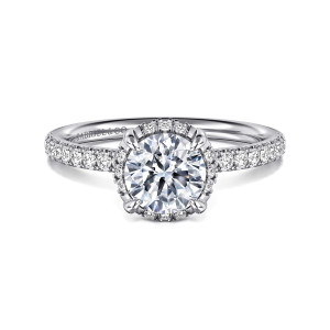 Gabriel & Co. ER16566R4W44JJ 14 karat white gold Contemporary engagement ring, front view of a round center with small diamonds peeking between four prongs and along the band