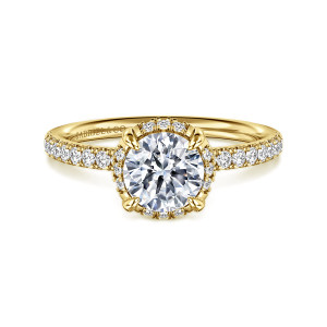 Gabriel & Co. ER16566R4Y44JJ 14 karat yellow gold Contemporary engagement ring, front view of a round center with small diamonds peeking out between the four prongs