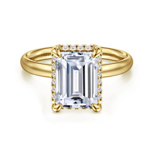 Gabriel & Co. ER16567E12Y44JJ 14 karat yellow gold Contemporary engagement ring, front view of a smooth rounded band meeting an emerald cut center with rounded corner prongs