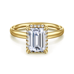 Gabriel & Co. ER16567E8Y44JJ 14 karat yellow gold Contemporary engagement ring, front view of an emerald cut center with diamonds framing all four sides below its edge