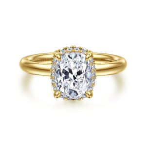 Gabriel & Co. ER16567G8Y44JJ 14 karat yellow gold Contemporary engagement ring, front view of the elongated cushion center with corner claws and a thin halo edge around it