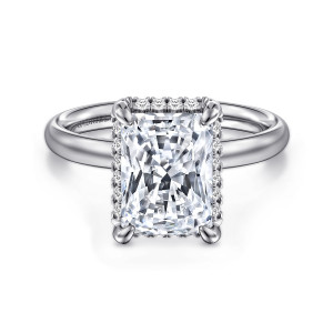 Gabriel & Co. ER16567N12W44JJ 14 karat white gold Contemporary engagement ring, front view of a radiant cut center with corner claws and small diamonds edging each side