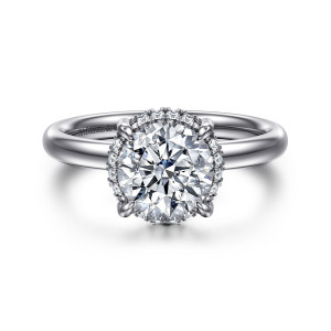 Gabriel & Co. ER16567R6W44JJ 14 karat white gold Contemporary engagement ring, front view of a round center with a thin ring of small stones peeking around its edge