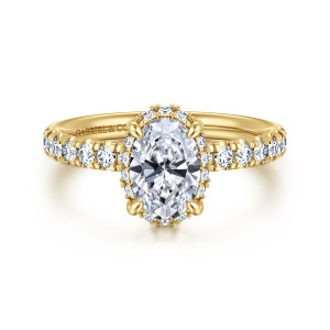Gabriel & Co. ER16568O4Y44JJ 14 karat yellow gold Contemporary engagement ring, front view of an oval center with a close halo and four rounded prongs at its corners