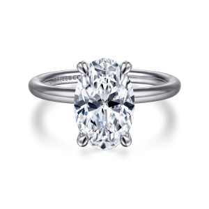Gabriel & Co. ER16569O12W4JJJ 14 karat white gold Contemporary engagement ring, front view of an oval center held by four claws on a plain slim band with no stones