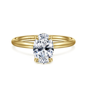 Gabriel & Co. ER16569O6Y4JJJ 14 karat yellow gold Contemporary engagement ring, front view of an oval center on four claw prongs above a thin smooth band