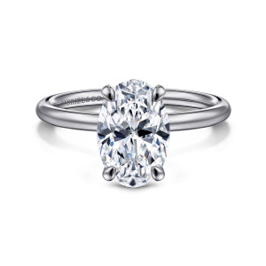 Gabriel & Co. ER16569O8W4JJJ 14 karat white gold Contemporary engagement ring, front view of an oval center with rounded prongs and an evenly smooth band