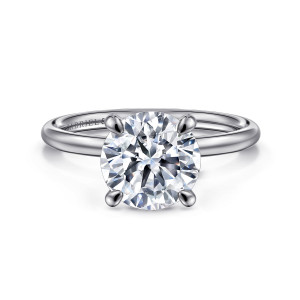 Gabriel & Co. ER16569R10W4JJJ 14 karat white gold Contemporary engagement ring, front view of a round center in four small prongs on a thin polished band