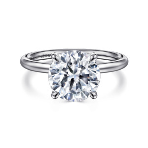 Gabriel & Co. ER16569R12W4JJJ 14 karat white gold Contemporary engagement ring, front view of a round center in four prongs on a thin polished band