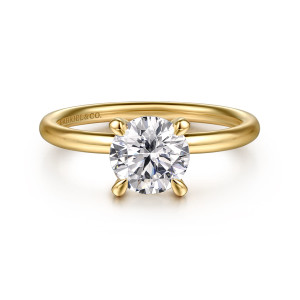 Gabriel & Co. ER16569R4Y4JJJ 14 karat yellow gold Contemporary engagement ring, front view of a round center in four rounded claws on a thin band